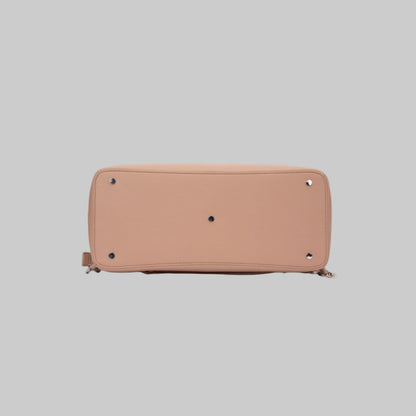 Kalos Luxe rosey taupe nappy bag with silver studs, spacious compartments, and luxury finishes.